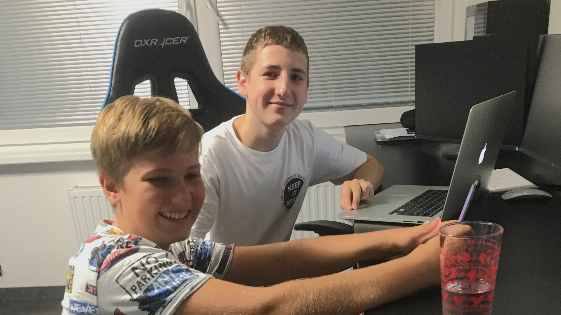 Avast parental control research: two boys reviewing the prototype on a laptop